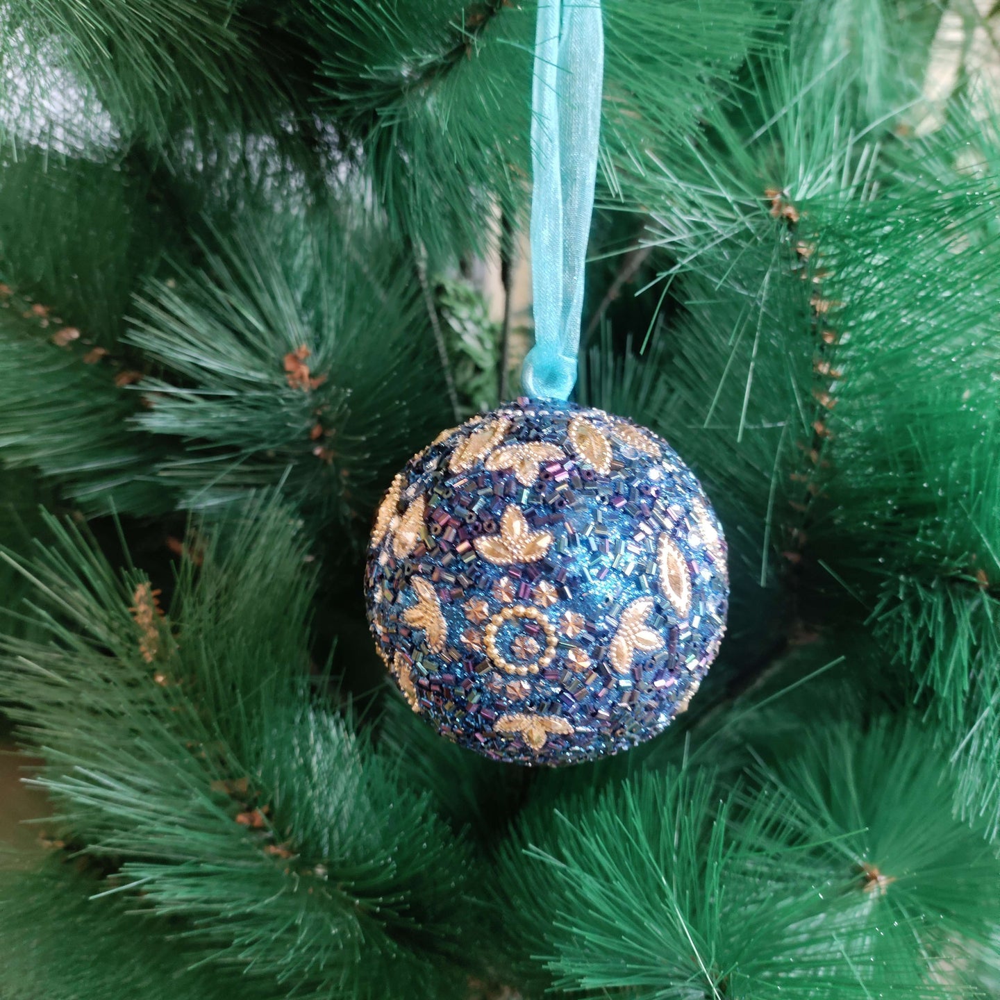 Golden Petals on Blue – Handcrafted Beaded Christmas Ornament