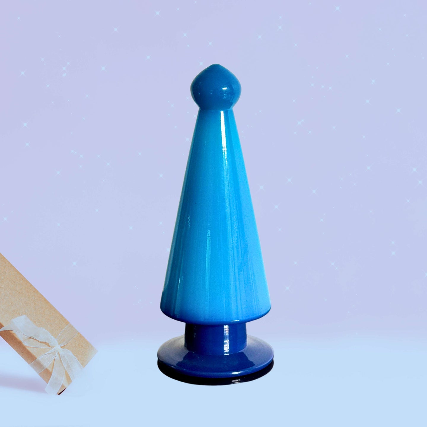 Ocean Breeze: Handcrafted Blue Glass Christmas Tree