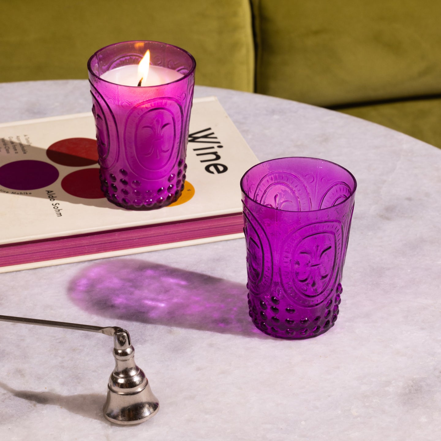 magenta glass votive candle